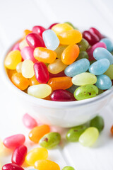 Sweet colorful jelly beans in bowl.
