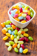 Sweet colorful jelly beans in bowl.