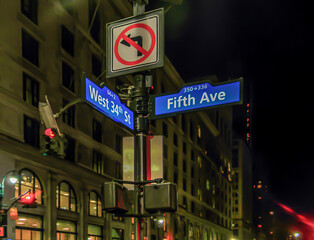 City street sign at night at Manhattan NYC USA