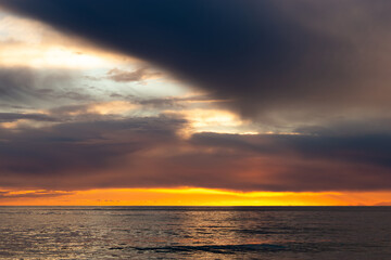 View of a sunset over a sea.