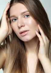 Portrait of young blonde woman.