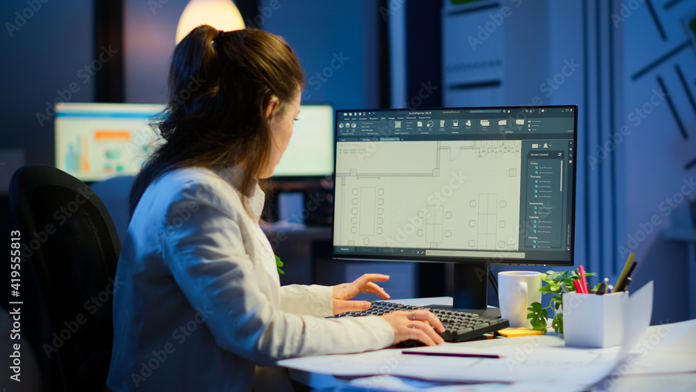 Poster woman architect matching digital plans from pc with blueprints working in start-up business office o