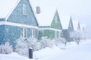 Houses in extremely cold, snowy and frosty winter storm conditions. - 419556483