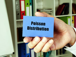Business concept about Poisson Distribution with inscription on the blue business card.
