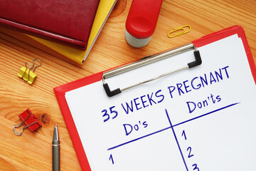  Financial concept meaning 35 WEEKS PREGNANT Do's and Don'ts with phrase on the piece of paper.