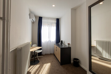 Interior of a hotel apartment, table, work area