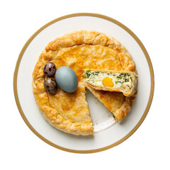 Torta Pasqualina isolated on white background. Traditional Italian savory Easter pie with spinach, chard, ricotta and whole eggs. Top view.