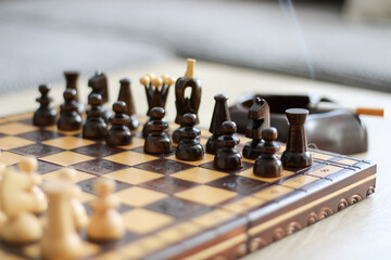 beige and brown wooden chess figures and chessboard 
