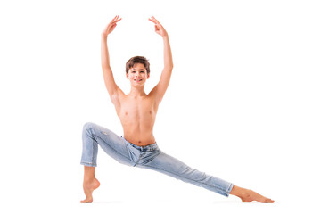 A teenage ballet dancer poses barefoot, isolated on a white background.
