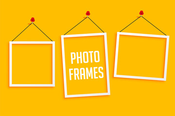 hanging photo frames on yellow background