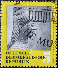 GERMANY, DDR - CIRCA 1959 : a postage stamp from Germany, GDR showing a head of an Attic goddess...