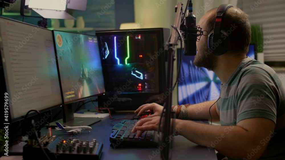 Poster game over for streamer playing space shooter video games using professional rgb keyboard and mouse. 