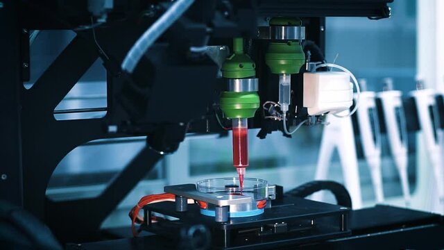3D printer prints tissues for human surgery. Bioprinting futuristic regenerative medicine. Real process of printing organs on a 3d printer