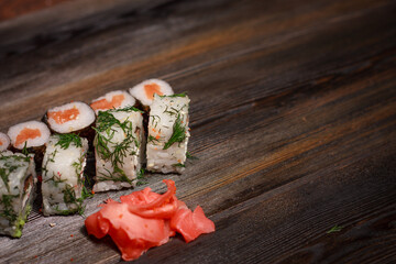 sushi set chopsticks red ginger asian cuisine lunch wooden table