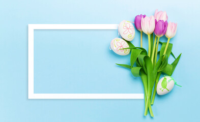 Easter greeting card with easter eggs and tulips