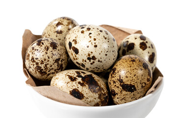 Boiled spotted quail eggs in a white ceramic  bowl , isolated on white background.  Healthy Food Products Concept