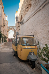 ape in a narrow street of Ostunis oldtown, Puglia