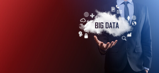 Businessman holds the inscription BIG DATA. Padlock , brain ,man, planet,graph, magnifier, gears, cloud, grid, document, letter, phone icon.