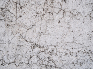 White cracked wall background texture pattern.