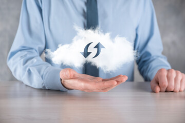 Cloud technology. Polygonal wireframe cloud storage sign with two arrows up and down on dark ....