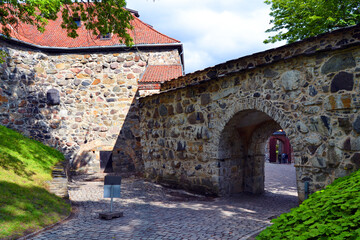 Fototapeta na wymiar Arch entrance in Akershus Fortress is a medieval edifice in Oslo, Norway.