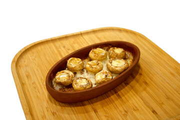 Baked white mushrooms in butter