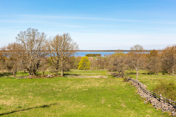 Rural landscape view with a lake in early spring