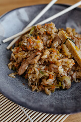 Rice with meat and vegetables in close-up