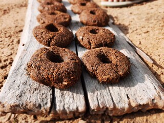 traditional handmade cow dung cakes or badculla for holi celebration in Indian culture