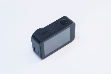 Compact action camera for shooting videos and photos on a white background.