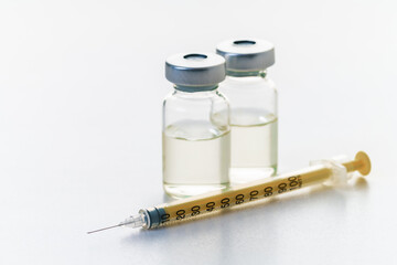 syringe and medicine bottle