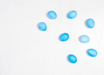 Easter eggs on white background. Easter concept. Top view.