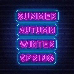 Summer, spring, autumn and winter neon signs on brick wall background. Light inscription of the seasons.