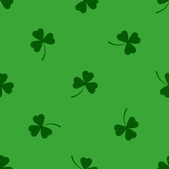 Fototapeta na wymiar Clover leaves shamrock seamless pattern on green background. Green lucky tree leaf clover plant print. Flat design cartoon style vector floral endless texture for Irish St. Patrick's day.