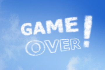 Naklejka na ściany i meble game over, cloud text , with exclamation mark on bright blue sky