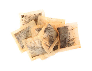 Used tea bags on white background, top view