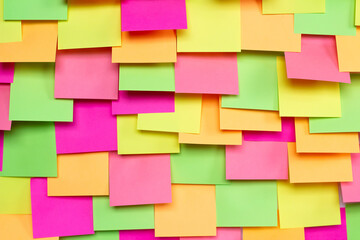 Creative layout made with lot of empty colorful paper sticky notes. To do list or reminder concept.