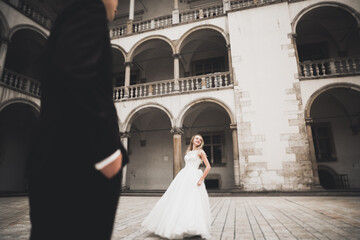 Sensual portrait of a young wedding couple. Outdoor