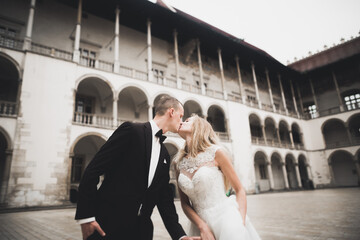 Caucasian happy romantic young couple celebrating their marriage. Outdoor