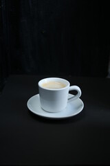 coffee cup on black background