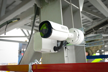 outdoor surveillance and security video camera installed on a metal structure