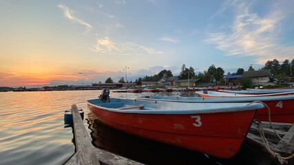 Naklejka na ściany i meble boats at sunset