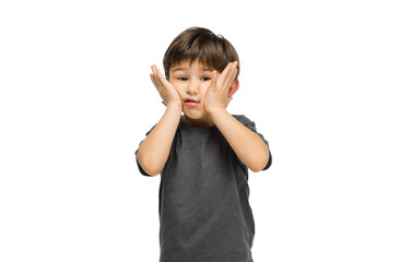 Astonished, shocked. Happy, smiley little caucasian boy isolated on white studio background with copyspace for ad. Looks happy, cheerful. Childhood, education, human emotions, facial expression