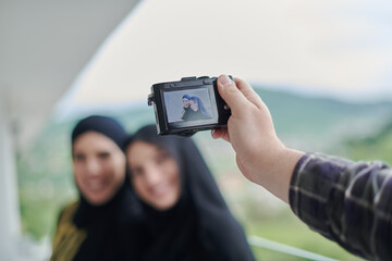 Portrait of young muslim women on the balcony