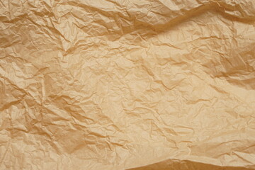 Crumpled beige paper for background