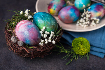 Fototapeta na wymiar Easter holiday concept with colored space egg
