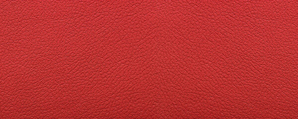 Clean red leather fullframe texture. Empty red leatherette closeup macro background.