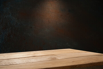 background wall and worn old wooden table