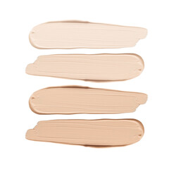 Smears of liquid foundation isolated on white background. Set of different skin tone cream swatches for makeup.