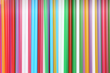 Obraz premium Heap of colorful plastic straws for drinks as background, closeup
